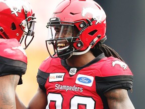 Calgary Stampeders Marken Michel celebrates after his touchdown against the Winnipeg Blue Bombers during CFL action in Calgary on Saturday, August 25, 2018.