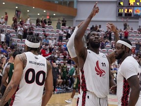 The Calgary Surge celebrate their 79-64 victory over the Saskatchewan Rattlers to claim their first playoff berth in team history on Saturday at WinSport Event Centre in Calgary