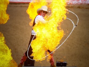 Rodeo entertainer Brinson James kicks off Day Nine of the Calgary Stampede Rodeo on Saturday, July 15.