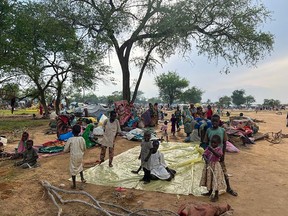 Sudanese refugees who fled the conflict in Sudan gather Monday, July 10, 2023, at the Zabout refugee Camp in Goz Beida, Chad.