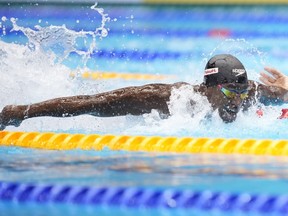 Josh Liendo of Canada competes during the men's 100m butterly semifinal at the World Swimming Championships in Fukuoka, Japan, Friday, July 28, 2023.