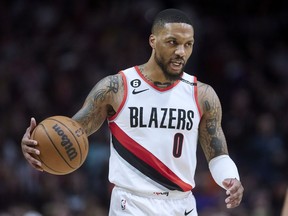 FILE - Portland Trail Blazers guard Damian Lillard brings the ball up against the New York Knicks during the second half of an NBA basketball game in Portland, Ore., Tuesday, March 14, 2023. Damian Lillard asked his team for a trade Saturday, July 1, a person with knowledge of the matter told The Associated Press.