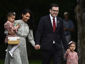 Terry Beech and his family arrive for a cabinet swearing-in ceremony at Rideau Hall in Ottawa on Wednesday, July 26, 2023.