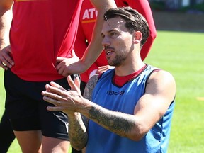 Cavalry FC's Ben Fisk gestures as the team discusses tactics during a practice.