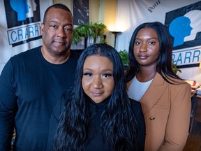 Keith Wright and daughters Kelsey, right, and Jodi are seeking compensation from Air Canada for punitive and moral damages arising from an incident they allege was racially motivated.
