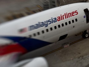 This file photo taken on June 16, 2014 shows a Malaysia Airlines plane parked on the tarmac at Kuala Lumpur International Airport in Sepang.