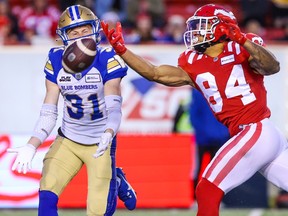 Calgary Stampeders receiver Reggie Begelton could not quite pull in this pass during CFL action against the Winnipeg Blue Bombers at McMahon Stadium in Calgary on Friday