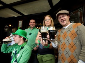 Drinkers sample some Guiness beer during St. Patrick's Day festivities at The Druid pub in Edmonton, Alta., on Sunday, March 17, 2013. Party attendees dressed in green, drank beer and wore Irish symbols. Ian Kucerak/Edmonton Sun/QMI Agency