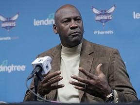FILE - Charlotte Hornets owner Michael Jordan speaks to the media about hosting the NBA All-Star basketball game during a news conference, Feb. 12, 2019, in Charlotte, N.C. The NBA Board of Governors has voted to approve Jordan's sale of the Charlotte Hornets to an ownership group led by Gabe Plotkin and Rick Schnall, according to a person familiar with the situation. The person spoke to The Associated Press on Sunday, July 23, 2023, on condition of anonymity because the sale won't become official for at least another week.