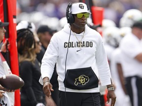 Head coach Deion Sanders of the Colorado Buffaloes watches action against the TCU Horned Frogs.