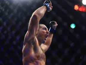 Sean Strickland of United States reacts as he claims victory over Israel Adesanya of Nigeria to become the new middleweight champion of the world during the UFC 293 event at Qudos Bank Arena on September 10, 2023 in Sydney, Australia.