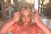 Britney Spears alarmed fans after dancing with a pair of butchers' knives.