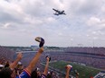 A plane flies by during a game between the Buffalo Bills and the Las Vegas Raiders at Highmark Stadium in Orchard Park, N.Y., Sunday, Sept. 17, 2023.