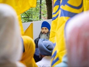 Protesters gather outside of the Consulate General of India Office during a protest for the recent shooting of Hardeep Singh Nijjar in Vancouver, on Saturday, June 24, 2023.