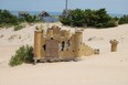 This quirky old remnant from a defunct mini-putt course at Jockey's Ridge State Park draws plenty of tourists to the dunes. Depending on the winds, sometimes it is completely covered with sand. Laura Shantora Nelles/Toronto Sun