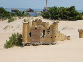 This quirky old remnant from a defunct mini-putt course at Jockey's Ridge State Park draws plenty of tourists to the dunes. Depending on the winds, sometimes it is completely covered with sand. Laura Shantora Nelles/Toronto Sun