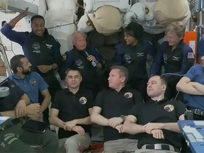 In this handout image released by NASA on May 22, 2023, four Axiom Mission 2 astronauts Peggy Whitson, John Shoffner, Ali Alqarni, and Rayyanah Barnawi gather for a crew greeting ceremony aboard the International Space Station with the seven members of Expedition 69, Frank Rubio, Woody Hoburg, and Stephen Bowen, UAE astronaut Sultan Alneyadi, and Roscosmos cosmonauts Dmitri Petelin, Andrey Fedyaev, and Sergey Prokopyev.