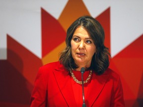 Premier Danielle Smith speaks to the media during the 24th World Petroleum Congress in Calgary on Monday, September 18, 2023.