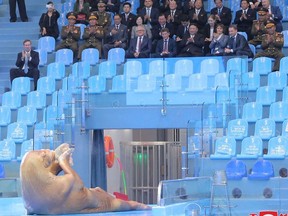 This picture taken on September 17, 2023 and released from North Korea's official Korean Central News Agency (KCNA) on September 18, 2023 shows North Korea's leader Kim Jong Un (C-seated front row) attending a walrus show at the Primorsky Regional Aquarium in Vladivostok, Primorsky region.