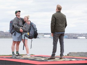 Calgary team Ty Smith and Kat Kastner with host Jon Montgomery on the season finale of Amazing Race Canada. The team took first place.