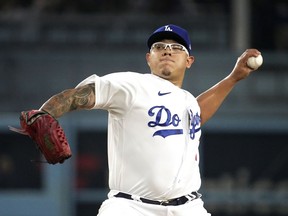 Los Angeles Dodgers starting pitcher Julio Urias throws to the plate during the first inning of a baseball game against the Atlanta Braves Friday, Sept. 1, 2023, in Los Angeles.