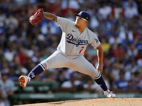 Los Angeles Dodgers starting pitcher Julio Urias pitches during the first inning of a baseball game against the Boston Red Sox, Saturday, Aug. 26, 2023, in Boston.