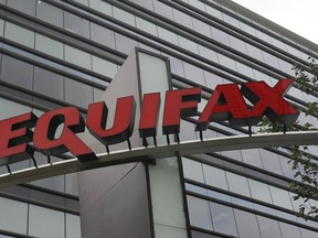 This July 21, 2012, file photo shows signage at the corporate headquarters of Equifax Inc. in Atlanta.