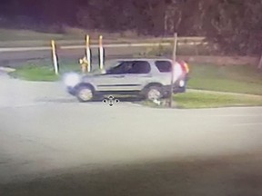 This image provided by Michigan State Police shows a vehicle driven by a person suspected of setting fire and shooting at multiple patrol vehicles in the Upper Peninsula.