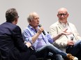 Paul Simon and Alex Gibney speak onstage at the "In Restless Dreams: The Music of Paul Simon" premiere during the 2023 Toronto International Film Festival at Princess of Wales Theatre on Sept. 10, 2023 in Toronto.