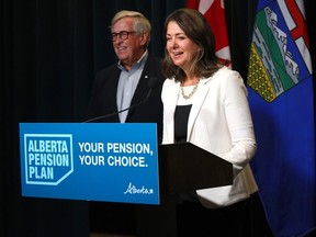Danielle Smith, Premier, Nate Horner, President of Treasury Board and Minister of Finance and Jim Dinning, chair, Alberta Pension Plan Report Engagement Panel release an independent report on a potential Alberta Pension Plan in Calgary on Wednesday, September 20, 2023. Darren Makowichuk/Postmedia