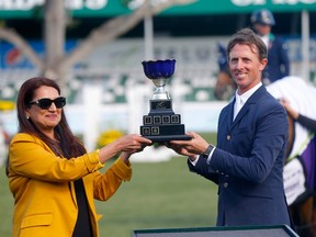 Rider, Ben Maher riding Exit Remo from GBR wins the Telus Cup competition in a jump off at the Masters at Spruce Meadows in Calgary