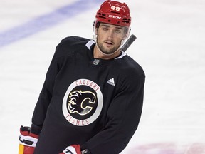 Calgary Flames' Dennis Gilbert takes part in team practice.