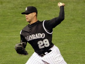 Dan Serafini of the Colorado Rockies delivers a pitch during a game against the San Francisco Giants in 2007.