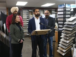 NDP finance critic Shannon Phillips and MLA Gurinder Brar spoke at an NDP press conference at Calgary Empire Carpet in northeast Calgary on Monday, October 23, 2023.