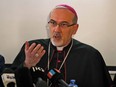 Latin Patriarch of Jerusalem Pierbattista Pizzaballa speaks during a press conference regarding the events at the funeral of slain Al Jazeera journalist Shireen Abu Akleh, at Saint Joseph Hospital in Israeli-annexed east Jerusalem on May 16, 2022.