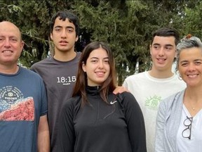 Aviv Kutz, left, his wife Livnat, right, and their children Rotem, centre, Yonatan, second left, and Yiftach, second right.