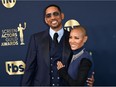 US actor Will Smith and his wife actress Jada Pinkett Smith arrive for the 28th Annual Screen Actors Guild (SAG) Awards at the Barker Hangar in Santa Monica, California, on February 27, 2022.