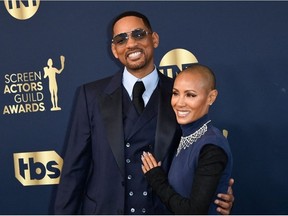 US actor Will Smith and his wife actress Jada Pinkett Smith arrive for the 28th Annual Screen Actors Guild (SAG) Awards at the Barker Hangar in Santa Monica, California, on February 27, 2022.
