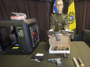 A database is needed to help keep track of privately made ghost guns, which are easy to make and hard to trace, says a historian at Saint Mary's University, in Halifax. Quebec provincial police Sgt. Audrey-Ane Bilodeau shows some of the 3D-printed ghost guns seized in Operation Centaure during a news conference in Montreal, Wednesday, June 21, 2023. The multi-police operation seized 440 guns, including 71 3D-printed ghost guns, across Canada.