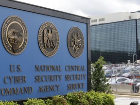 FILE - A sign stands outside the National Security Agency (NSA) campus, June 6, 2013, in Fort Meade, Md. A former National Security Agency employee from Colorado pleaded guilty, Monday, Oct. 23, 2023, to trying to sell classified information to Russia.