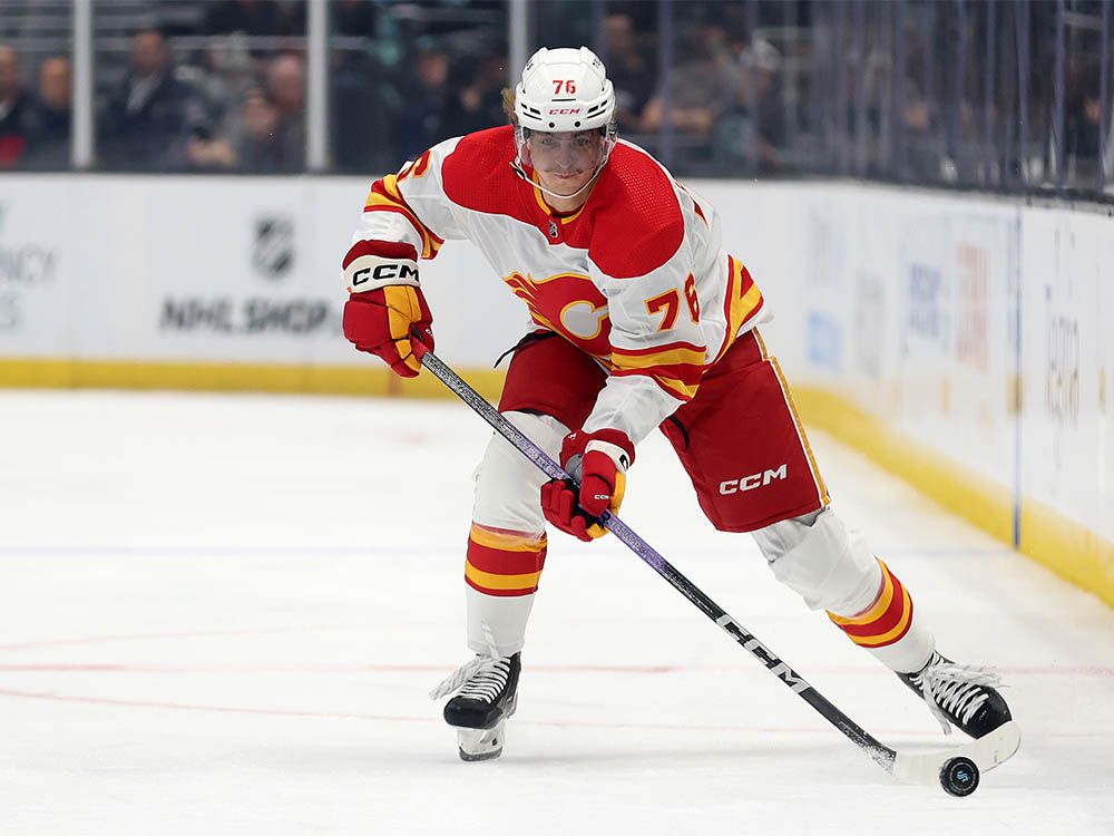 Martin Pospisil #76 of the Calgary Flames skates in his NHL debut against the Seattle Kraken during the first period at Climate Pledge Arena on Nov. 4, 2023 in Seattle, Washington.