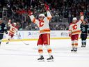 Martin Pospisil #76 of the Calgary Flames celebrates an empty-net goal against the Seattle Kraken during the third period at Climate Pledge Arena on November 04, 2023 in Seattle, Washington.