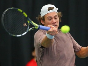 Canadian men's tennis player Liam Draxl plays against Australian Luke Saville during play in the National Bank Challenger at the Osten and Victor Tennis Centre in Calgary
