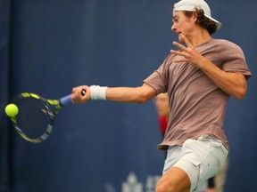 Canadian men's tennis player Liam Draxl plays against Australian Luke Saville during play in the National Bank Challenger at the Osten and Victor Tennis Centre in Calgary on Wednesday, November 8, 2023. Draxl won in straight set