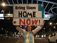 People demonstrate prior any hostage announcements outside the Kyria defense complex as the political cabinet hold a meeting on November 21, 2023 in Tel Aviv, Israel.