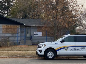 A court order authorized the Safer Communities and Neighbourhoods (SCAN) unit of the Alberta Sheriffs to board up this drug house in Lloydminster and erect a fence to prevent anyone from entering the property until Dec. 16, 2021.