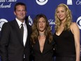 Matthew Perry, Jennifer Aniston and Lisa Kudrow pose together after accepting the award for favourite television comedy series at the 29th Annual People's Choice Awards Sunday, Jan. 12, 2003, in Pasadena, Calif.