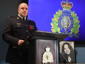 A photo of 16 year-old Pauline Brazeau rests on a table as RCMP Supt. David Hall announces an arrest in her killing 47 years ago.
