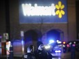 Police respond to the scene of a shooting on Monday, Nov. 20, 2023 in Beavercreek, Ohio. Police say a shooter opened fire at a Walmart, wounding four people before apparently killing himself. The attack took place Monday night at a Walmart in Beavercreek, in the Dayton metropolitan area.