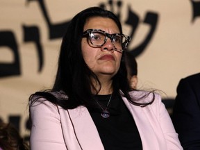 U.S. Rep. Rashida Tlaib (D-MI) listens during a news conference that called for a ceasefire in Gaza outside the U.S. Capitol building in Washington, D.C., Monday, Nov. 13, 2023.
